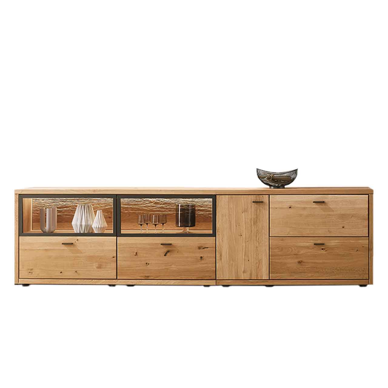 WM 2250 - Lowboard 2744 WM 2250 - Lowboard 2744 der Extraklasse mit zwei Virienenauschnitte darunter liegend je einen geräumigen Auszug, seitlich befindet sich eine Holztür und zwei weitere Auszüge.